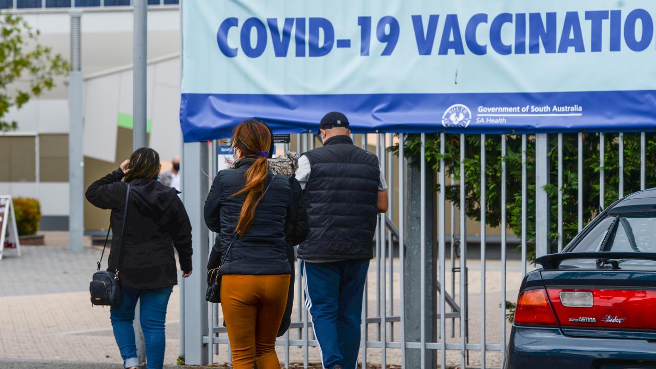 People head into the Wayville vaccination hub for a jab. Picture: NCA NewsWire/Brenton Edwards