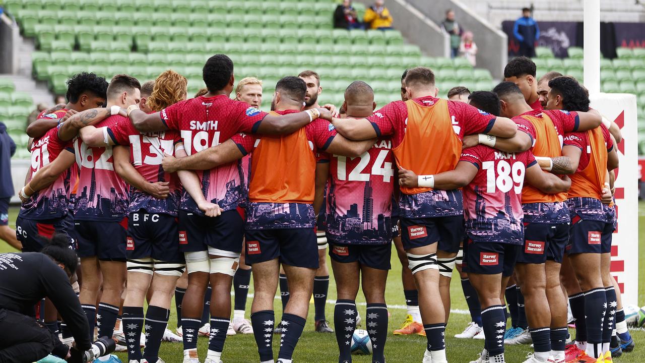 MELBOURNE, AUSTRALIA - MAY 07: The Rebels huddle before the round 11 Super Rugby Pacific match between Melbourne Rebels and ACT Brumbies at AAMI Park, on May 07, 2023, in Melbourne, Australia. (Photo by Daniel Pockett/Getty Images)