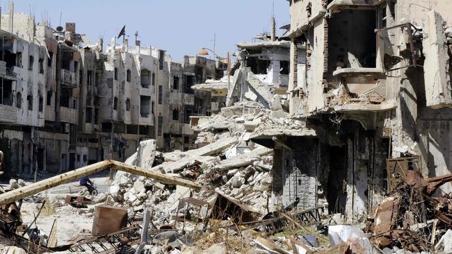 A general view shows destroyed buildings in the government-held Jouret al-Shiah neighbourhood of the central Syrian city of Homs.