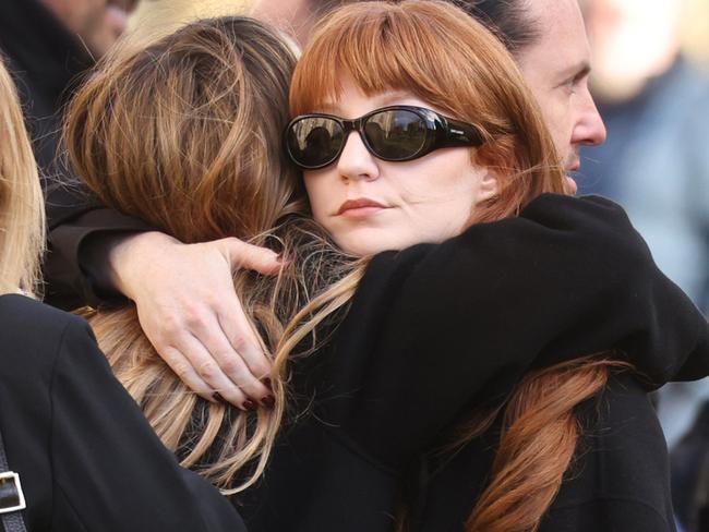 Girls Aloud singer Nicola Roberts embraced a friend. Picture: Dan Kitwood/Getty Images