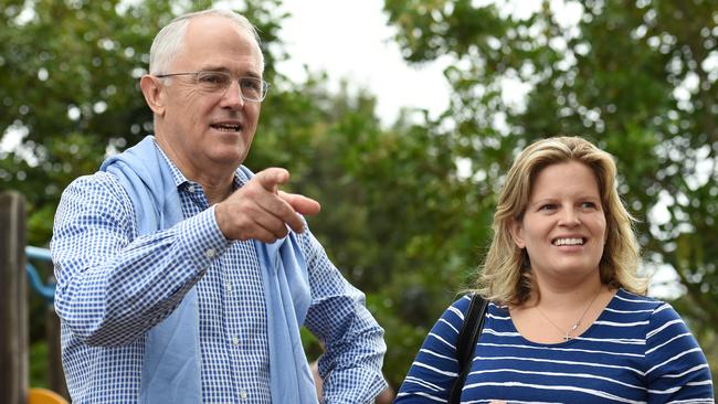 Australian Prime Minister Malcolm Turnbull talks with his daughter Daisy on Sunday. Picture: AAP Image/Paul Miller