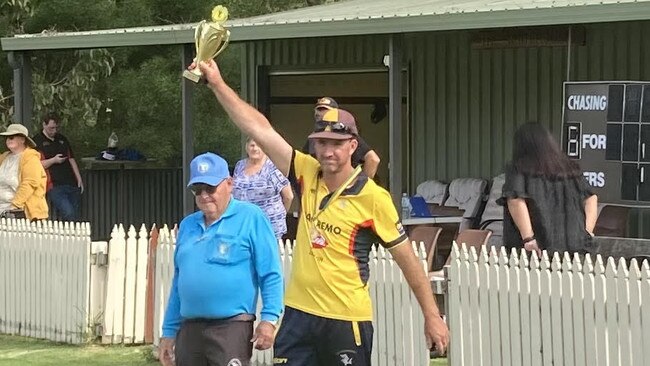 Phillip Island C-grade captain Mick Cleary lift the C-grade premiership last season. The team won the title without winning a coin toss. Picture: Contributed.