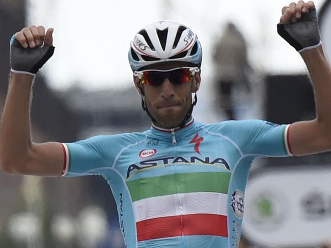 Italy's Vincenzo Nibali celebrates as he crosses the finish line at the end of the 201 km second stage of the 101th edition of the Tour de France cycling race on July 6, 2014 between York and Sheffield, northern England. AFP PHOTO / ERIC FEFERBERG