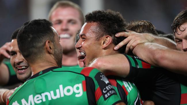 Isaiah Tass celebrates a try on debut. Picture: NRL Photos