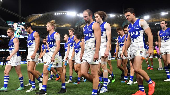 North Melbourne players walk off Adelaide Oval after losing to the Power last Friday night. Picture: AAP