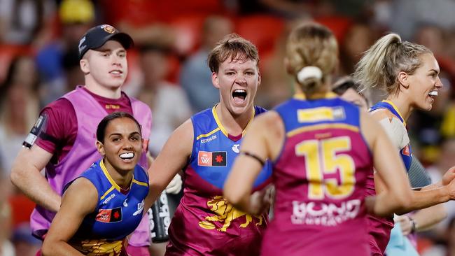 Dakota Davidson fires up her teammates as the Lions gain the upper hand. Picture: Dylan Burns/AFL Photos via Getty Images