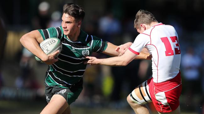 Jack Howarth sees off his Ipswich Grammar School opponent. Picture: AAP Image/Josh Woning