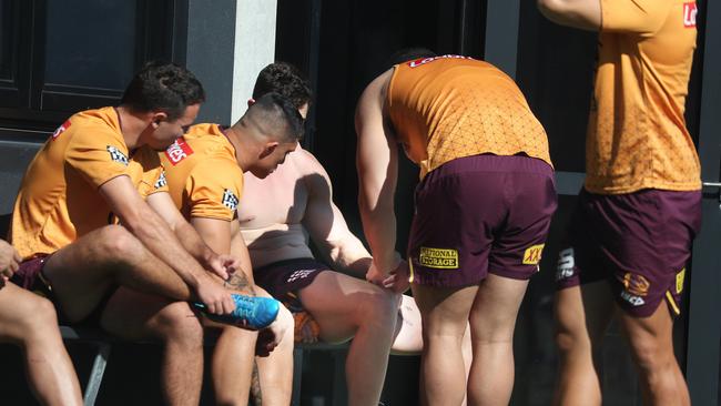 David Fifita looks at Corey Oates leg. at Red Hill. Pic Annette Dew