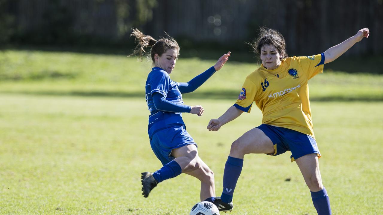 Madison Lockwood (left) scores for Rockville Rovers against USQ FC in Toowoomba Football League Premier Women round 14 at Captain Cook ovals, Sunday, July 18, 2021. Picture: Kevin Farmer