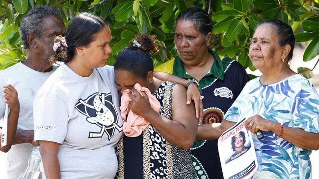 Yarrabah woman Kamaree Major (centre) is comforted by relatives Eric Sands, Paige Fourmile, Moira Murgha and Adelaide Sands as she sheds tears for her missing son Markiah Major, 17, who was last seen in Cairns on August 15. Picture: Brendan Radke