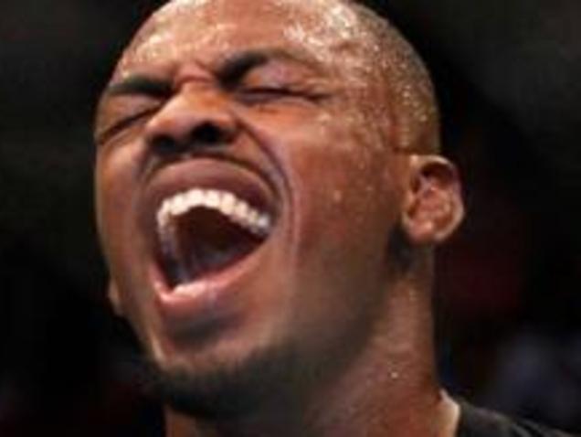 ATLANTA, GA - APRIL 21: Jon Jones celebrates defeating Rashad Evans by unanimous decision in their light heavyweight title bout for UFC 145 at Philips Arena on April 21, 2012 in Atlanta, Georgia. (Photo by Kevin C. Cox/Getty Images)