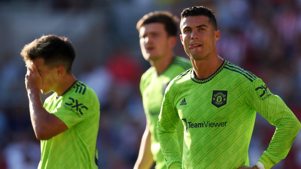 Cristiano Ronaldo and Lisandro Martinez of Manchester United look dejected during after a loss to Brentford FC. Picture: Catherine Ivill