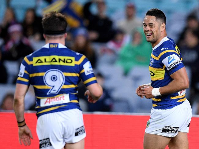 Jarryd Hayne of the Eels (right) celebrates with Reed Mahoney after scoring a try during the Round 25 NRL match between the Parramatta Eels and the Sydney Roosters at ANZ Stadium in Sydney in 2018. Picture: AAP Image/Dan Himbrechts.