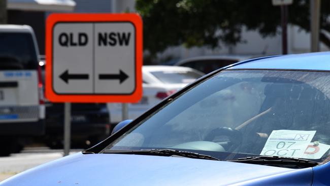 Police check cars at the Queensland-NSW border on Griffith Street, Coolangatta. Picture: NCA NewsWire/Steve Holland