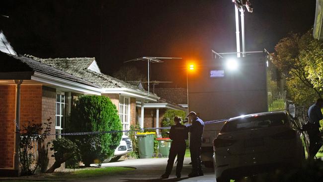 Police at the Nunawading unit on Saturday night. Picture: Sarah Matray