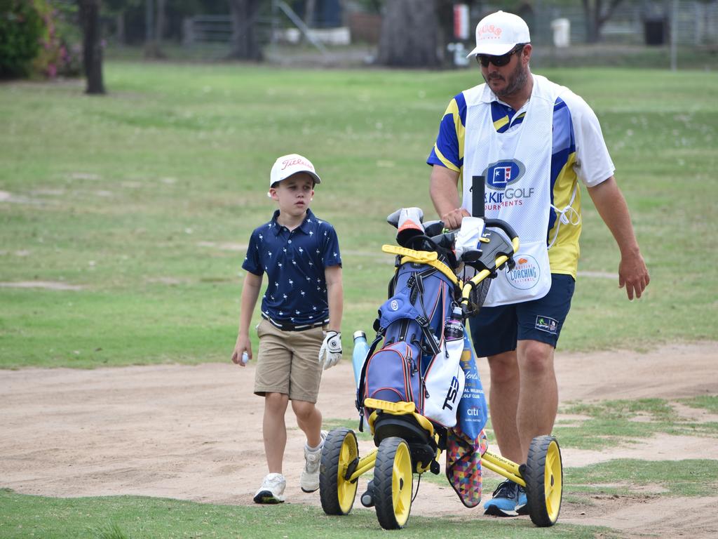 Rockhampton's RJ Pershouse (boys eight years) and Richie Pershouse during the second day's play at the US Kids Golf Foundation Australian Open at the Rockhampton Golf Club on September 28.