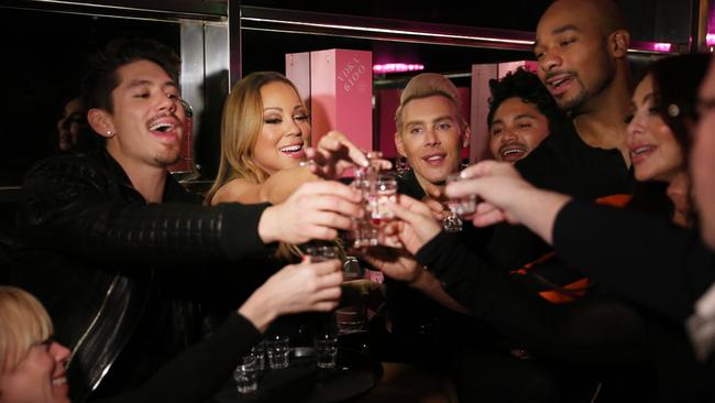 In the new doco-series Mariah's World, Mariah Carey can been seen getting close with backup dancer Bryan Tanaka. Picture: E!/Universal.