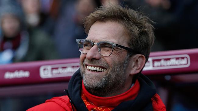 Liverpool's German manager Jurgen Klopp reacts ahead of the English Premier League football match between Aston Villa and Liverpool at Villa Park in Birmingham, central England on February 14, 2016. / AFP / ADRIAN DENNIS / RESTRICTED TO EDITORIAL USE. No use with unauthorized audio, video, data, fixture lists, club/league logos or 'live' services. Online in-match use limited to 75 images, no video emulation. No use in betting, games or single club/league/player publications. /