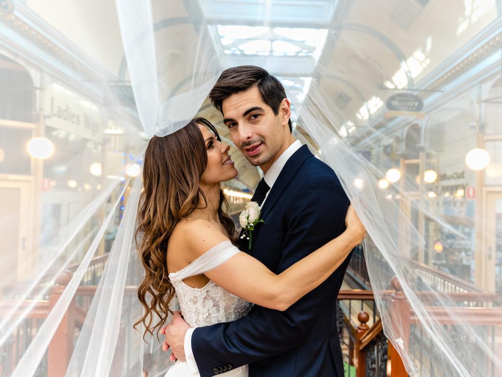 Gaylene Schirripa and Antony Delo, married at St Andrews Anglican Church, Scott Goh Photography. Gaylene: “We got hitched... but restrictions meant we had to cull the guest list to 100 and have no dancing but alcohol. We had a ball, it was so much fun, and we even managed to dance sitting down – if that makes sense.”