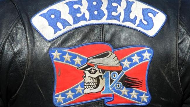 A Members of the Rebels MC joins members from 14 NSW outlaw motorcycle gangs at Moore Park as part of the United Motorcycle Council for a Legalise Freedom ride, Sydney, Saturday, June 13, 2009. The clubs represented were Hells Angels, Bandidos, Rebels, Comanchero, Nomads, Finks, Black Uhlans, Vietnam Veterans, Phoenix, Grave Diggers, Outcasts, Life and Death, Gods Squad and Bikers for Christ. (AAP Image/Dean Lewins) NO ARCHIVING, INTL OUT