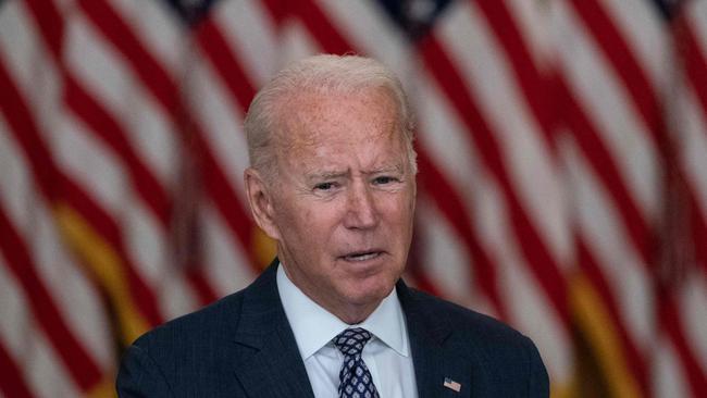 US President Joe Biden responds to questions about the ongoing US military evacuations of US citizens and vulnerable Afghans on Friday. Picture: AFP`