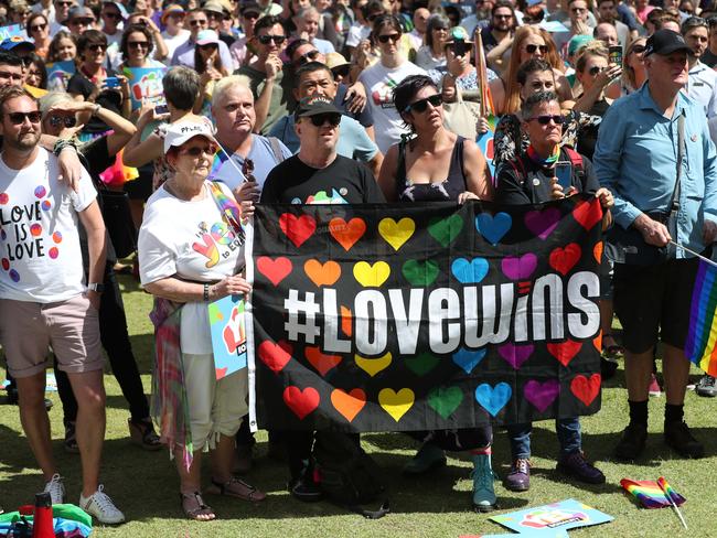 Perth: Same-sex couples and their friends and family gather at Queens Gardens this morning to watch the SSM result announced live by the ABS. Picture: Peter Wallis