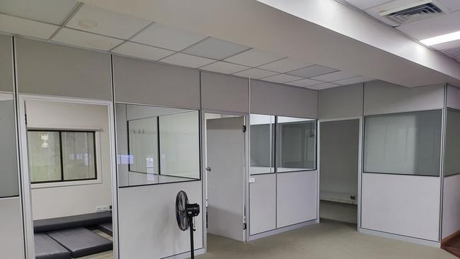 The “rooms” feature inner windows and are clustered together, like cubicles.