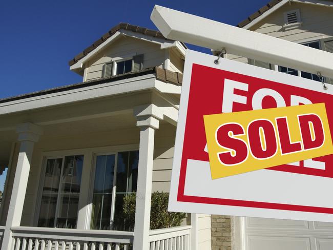 Sold Home For Sale Sign in Front of New House