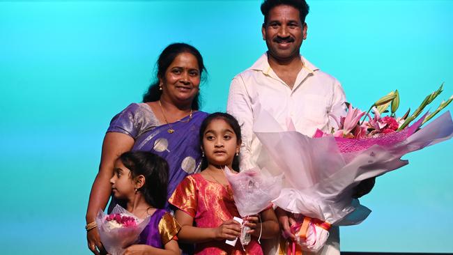 BILOELA, AUSTRALIA - JUNE 11: Priya and Nades Nadesalingam, also known as Murugappan, and their daughters Kopika (C) and Tharnicaa are welcomed back by supporters and members of the community on June 11, 2022 in Biloela, Australia. (Photo by Dan Peled/Getty Images)