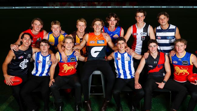 First round draft selections Bailey Humphrey of the Suns, Oliver Hollands of the Blues, Jaspa Fletcher of the Lions, Jhye Clark of the Cats, George Wardlaw of the Kangaroos, Will Ashcroft of the Lions, Aaron Cadman of the Giants, Harry Sheezel of the Kangaroos, Elijah Tsatas of the Bombers, Reuben Ginbey of the Eagles, Cameron Mackenzie of the Hawks, Jedd Busslinger of the Bulldogs and Mattaes Phillipou of the Saints. Picture: Dylan Burns/AFL Photos via Getty Images