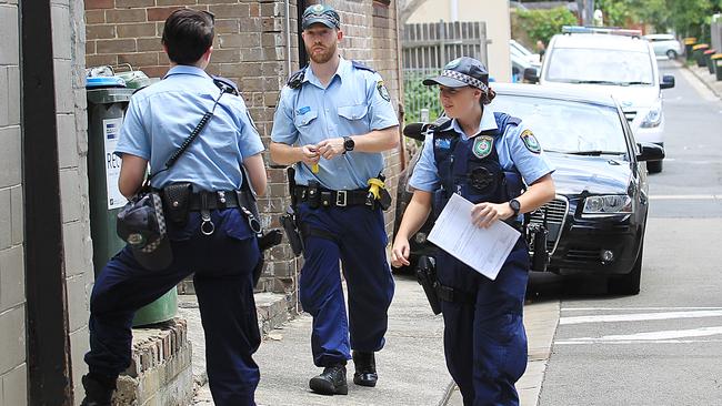 Police arriving at the unit where two bodies were found above 85 King Street in Newtown. Picture: Danny Aarons