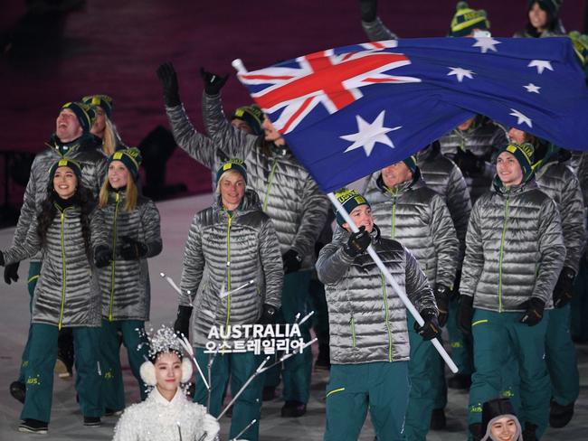 Australia‘s flag-bearer Scotty James leads the delegation as they parade during the opening ceremony of the PyeongChang 2018 Winter Olympic Games at the PyeongChang Stadium. Picture: AFP