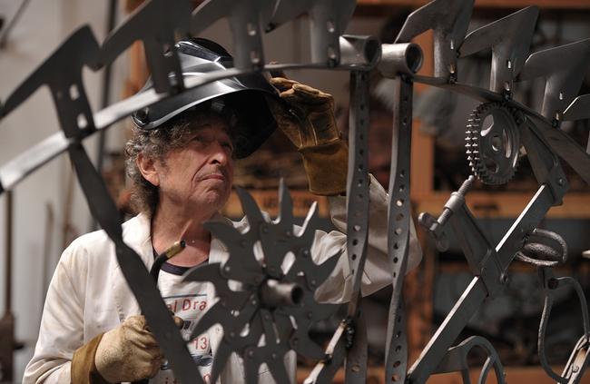 Bob Dylan working on one of his iron pieces at his studio. Picture: Heaven's Door