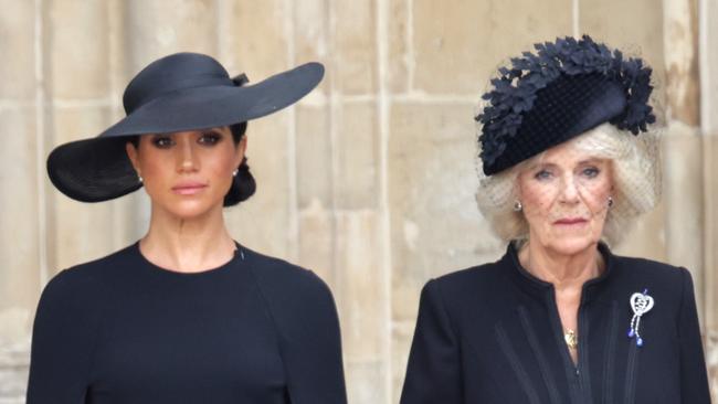 The book claims Queen Consort Camilla attempted to make Meghan Markle feel welcome after she joined the royal family. Picture: Getty Images