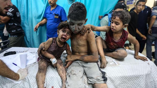 Palestinians injured in Israeli air raids arrive at Nasser Medical Hospital on October 24. Picture: Getty