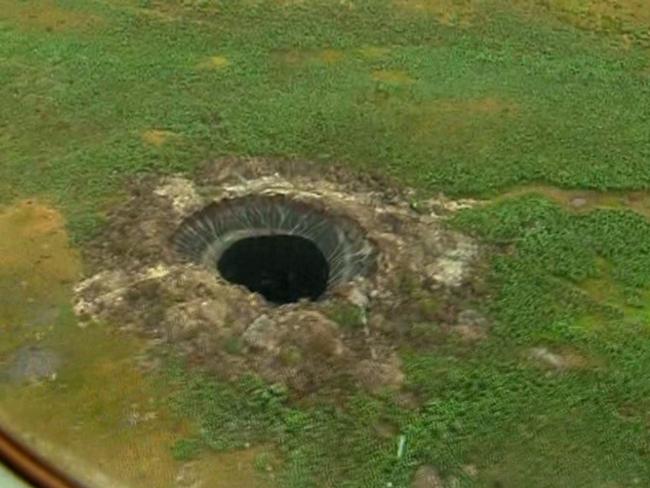 Altered landscape ... Three deep vent holes have now been found blasted into the desolate permafrost of Siberia.