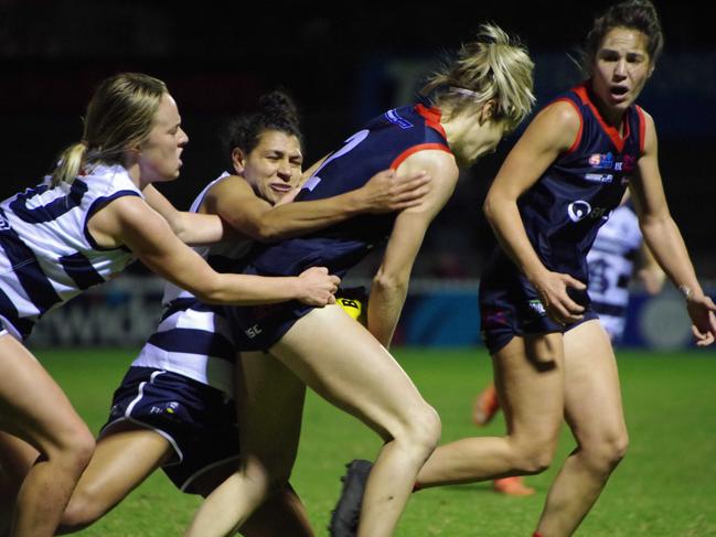 South Adelaide's Czenya Cavouras (front) tackles Norwood's Monique Hollick during their SANFLW semi-final clash at Norwood Oval. Picture: John Emery