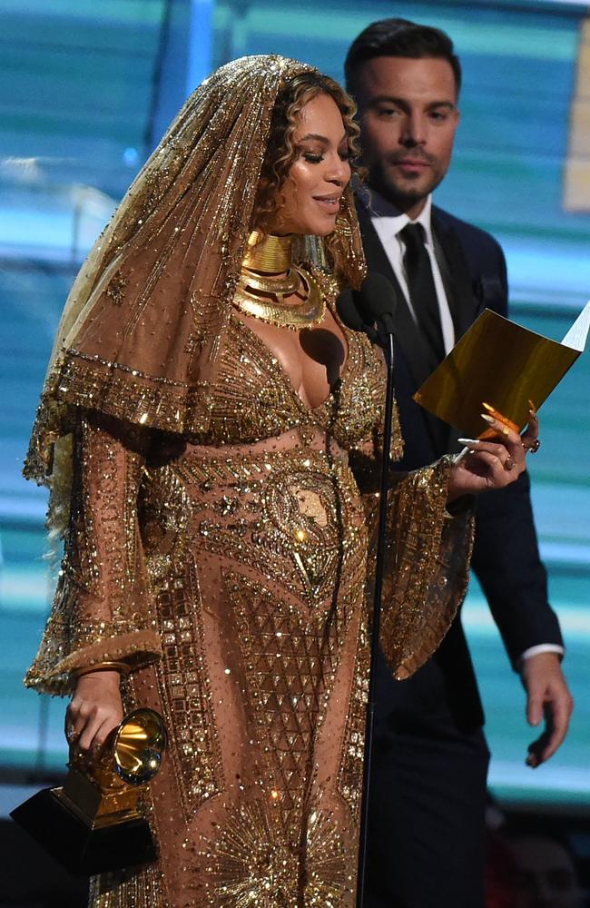 Beyonce receives a Grammy onstage during the 59th Annual Grammy music Awards on February 12, 2017, in Los Angeles, California. Picture: AFP