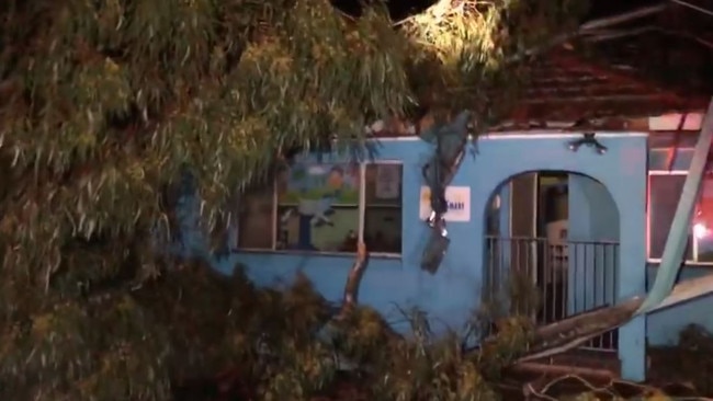 The tree landed on the roof of Quakers Hill Kindergarten and Child Care Centre. Picture: Blacktown SES