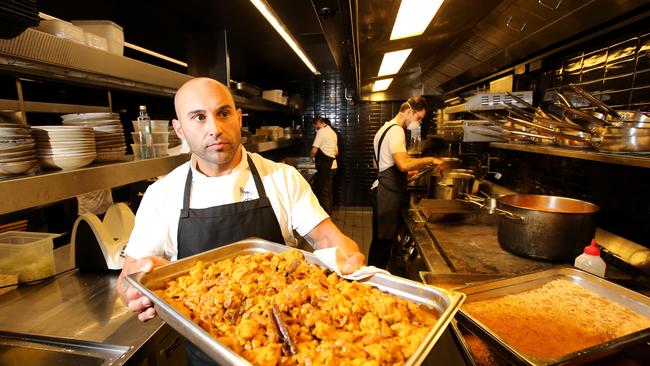 Chef Shane Delia is getting his hands dirty in the kitchen, supplying healthy family food, while the dining area of his Maha restaurant is closed. Picture: Stuart McEvoy