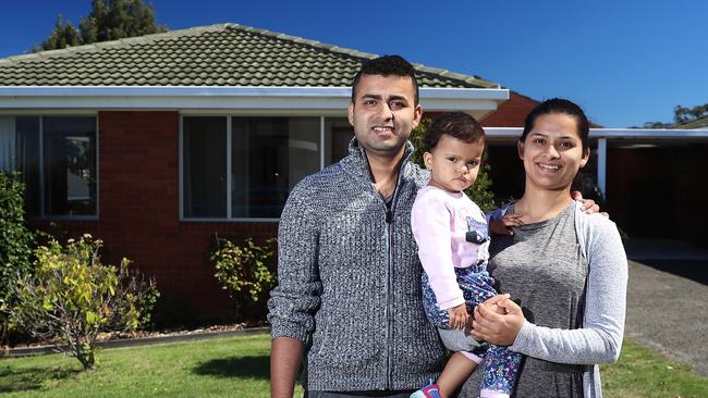 Bidur Adhikari with wife Sushma and daughter Shlesha at an open home for a rental unit in Bellerive. Picture: LUKE BOWDEN