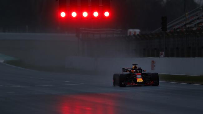 Daniel Ricciardo topped the opening day of F1 testing in Spain.