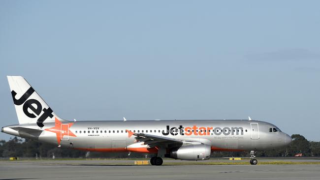 A Jetstar plane lands at Melbourne Airport. Picture: NCA NewsWire / Andrew Henshaw