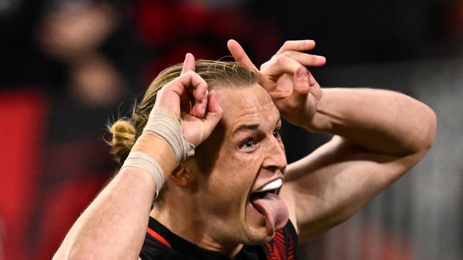 PERTH, AUSTRALIA - MAY 27: Mason Redman of the Bombers celebrates a goal during the 2023 AFL Round 11 match between the West Coast Eagles and the Essendon Bombers at Optus Stadium on May 27, 2023 in Perth, Australia. (Photo by Daniel Carson/AFL Photos via Getty Images)