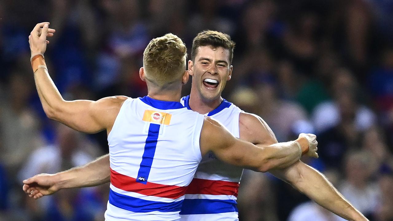 Josh Dunkley and Adam Treloar celebrate a goal. Picture: Getty Images