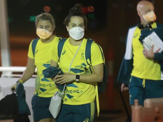 Members of the Australian Olympic team arrive at Darwin International Airport from Tokyo to Quarantine at the Howard Springs Facility for 14 days.Picture: Glenn Campbell