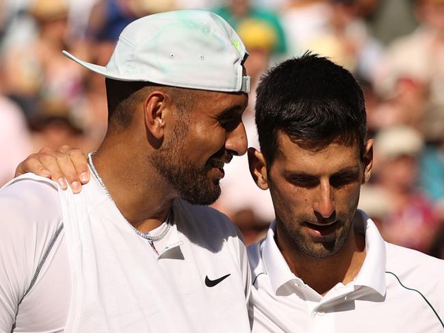 LONDON, ENGLAND - JULY 10: Winner Novak Djokovic of Serbia (R) and runner up Nick Kyrgios of Australia interact by the net following their Men's Singles Final match on day fourteen of The Championships Wimbledon 2022 at All England Lawn Tennis and Croquet Club on July 10, 2022 in London, England. (Photo by Ryan Pierse/Getty Images)