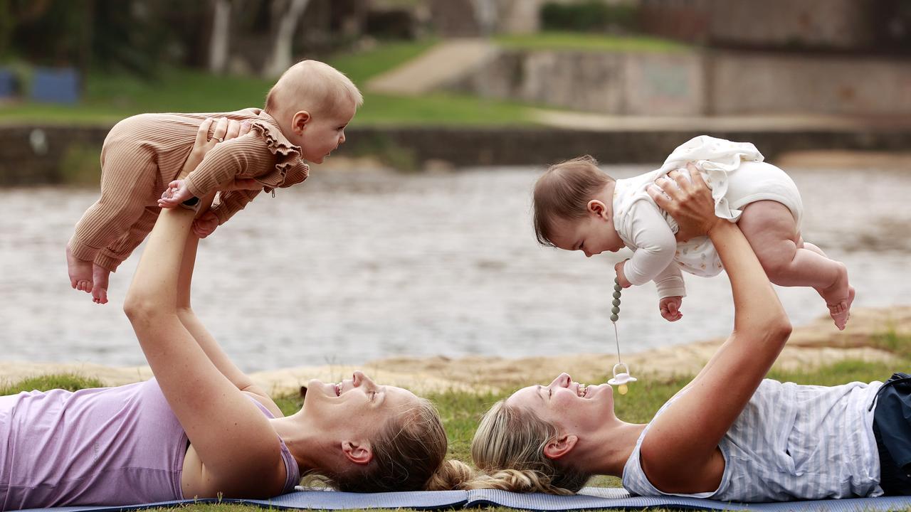 Sally Jooste with her five-month-old daughter Willow and Emily Gonzalez with her six-month-old daughter Camila at the Buggy Boot Camp. Picture: Tim Hunter.