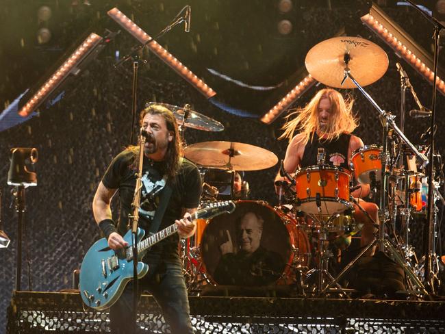 Hawkins on stage with Dave Grohl in Geelong. Picture: Brett Schewitz / Frontier Touring