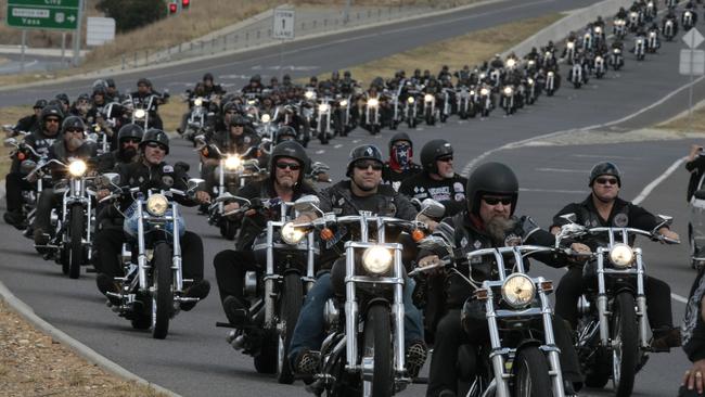 More than 300 members of Rebels Motorcycle Club escort the body of their murdered comrade.